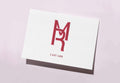 White gift card with red MR logo on a light pink background. The card reads "E-Gift Card".