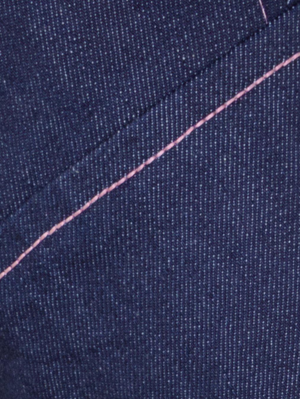 Light pink topstitching detail.